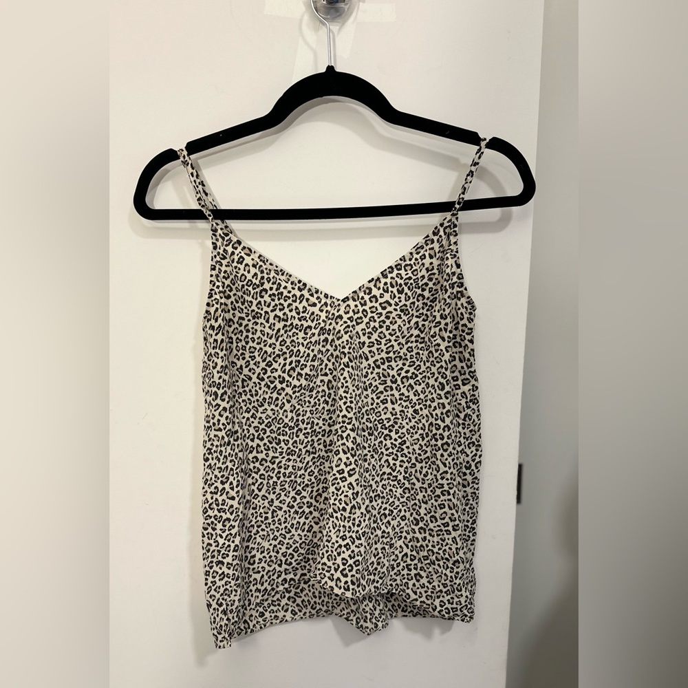 Frame with leopard animal print shirt for sale.